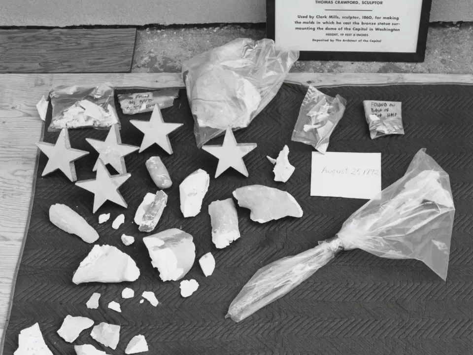 Artifacts and a sign describing them.